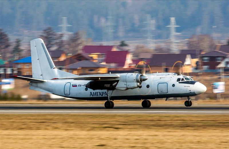 RUSSIA-AIRPLANE/CRASH SITE Smoke rises at the crash site of an Angara Airlines An-24 passenger plane near Tynda in the Amur Region, Russia July 24, 2025, in this still image taken from video. Federal Air Transport Agency/Handout via REUTERS ATTENTION EDITORS - THIS IMAGE HAS BEEN SUPPLIED BY A THIRD PARTY. NO RESALES. NO ARCHIVES. MANDATORY CREDIT.