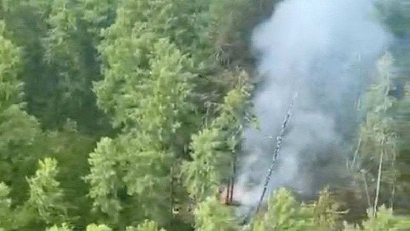 Smoke rises at the crash site of an Angara Airlines An-24 passenger plane near Tynda in the Amur Region, Russia July 24, 2025, in this still image taken from video. Federal Air Transport Agency/Handout via REUTERS ATTENTION EDITORS - THIS IMAGE HAS BEEN SUPPLIED BY A THIRD PARTY. NO RESALES. NO ARCHIVES. MANDATORY CREDIT.