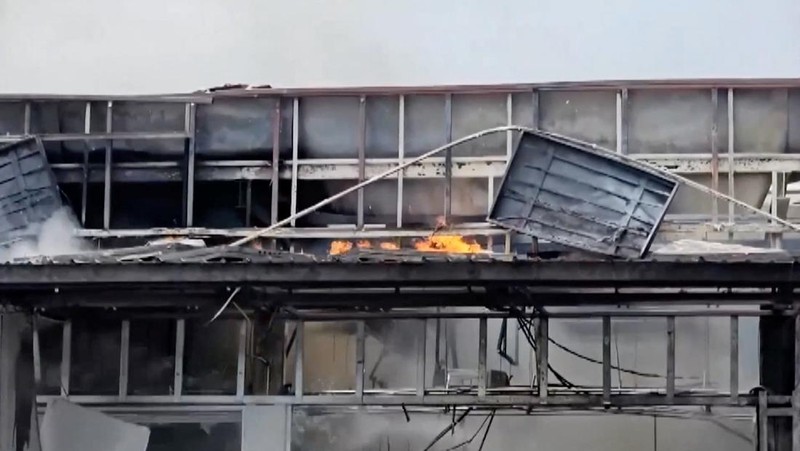 Smoke rises from a convenience store at a gas station, amid the clashes between Thailand and Cambodia, in Kantharalak district, Sisaket province, Thailand, July 24, 2025, in this screengrab obtained from a handout video.  TPBS/Handout via REUTERS    THIS IMAGE HAS BEEN SUPPLIED BY A THIRD PARTY. THAILAND OUT. NO COMMERCIAL OR EDITORIAL SALES IN THAILAND.