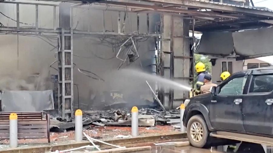 THAILAND-CAMBODIA/ Smoke rises from a convenience store at a gas station, amid the clashes between Thailand and Cambodia, in Kantharalak district, Sisaket province, Thailand, July 24, 2025, in this screengrab obtained from a handout video. TPBS/Handout via REUTERS THIS IMAGE HAS BEEN SUPPLIED BY A THIRD PARTY. THAILAND OUT. NO COMMERCIAL OR EDITORIAL SALES IN THAILAND.