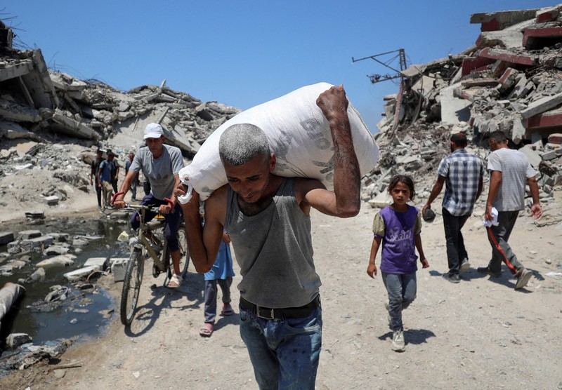 Bantuan kemanusiaan dijatuhkan melalui udara di Gaza, MInggu (27/7/2025). (REUTERS/Dawoud Abu Alkas) Bantuan kemanusiaan dijatuhkan melalui udara di Gaza, MInggu (27/7/2025). (REUTERS/Dawoud Abu Alkas)