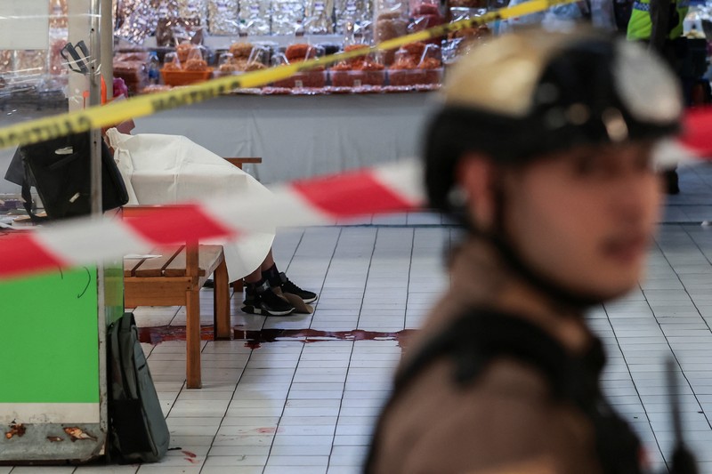 Penembakan massal mengguncang ibu kota Thailand, Bangkok. Penembakan massal mengguncang ibu kota Thailand, Bangkok, Senin (28/7/2025). Empat orang dilaporkan tewas. (REUTERS/PATIPAT JANTHONG)