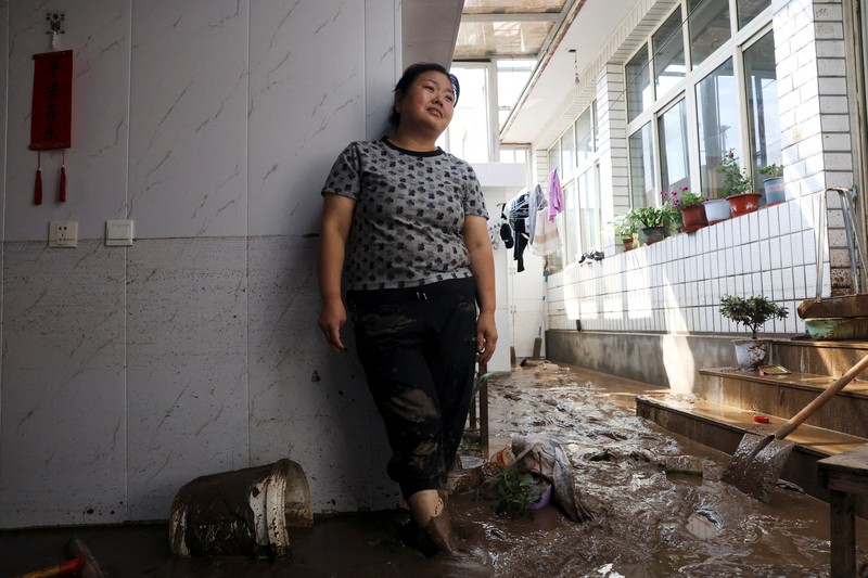Kondisi banjir usai hujan deras di distrik Miyun, Beijing, China, Selasa (29/7/2025). (REUTERS/Florence Lo) Kondisi banjir usai hujan deras di distrik Miyun, Beijing, China, Selasa (29/7/2025). (REUTERS/Florence Lo)