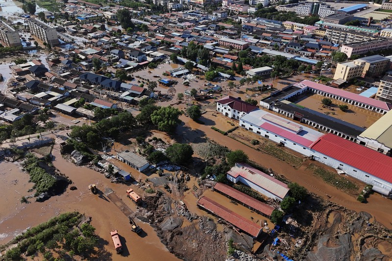 Kondisi banjir usai hujan deras di distrik Miyun, Beijing, China, Selasa (29/7/2025). (REUTERS/Florence Lo)