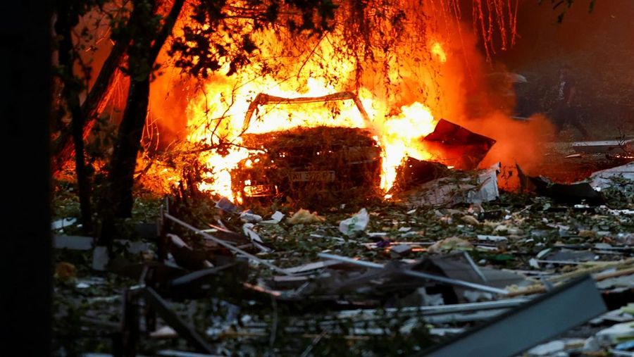 A car damaged during Russian missile and drone strikes burn, amid Russia’s attack on Ukraine, in Kyiv, Ukraine July 31, 2025. REUTERS/Valentyn Ogirenko