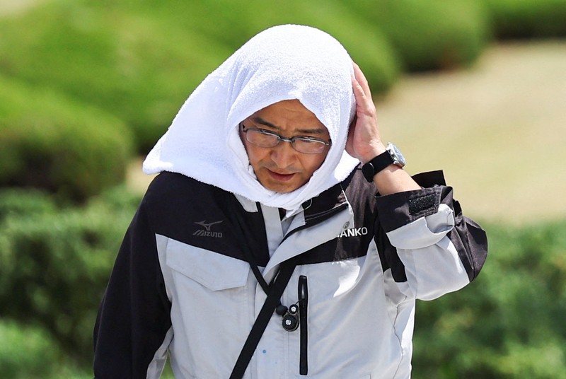 Gelombang panas melanda sejumlah wilayah di Jepang, Selasa (5/8/2025) waktu setempat. Gelombang panas melanda sejumlah wilayah di Jepang, Selasa (5/8/2025) waktu setempat. (REUTERS/Issei Kato)