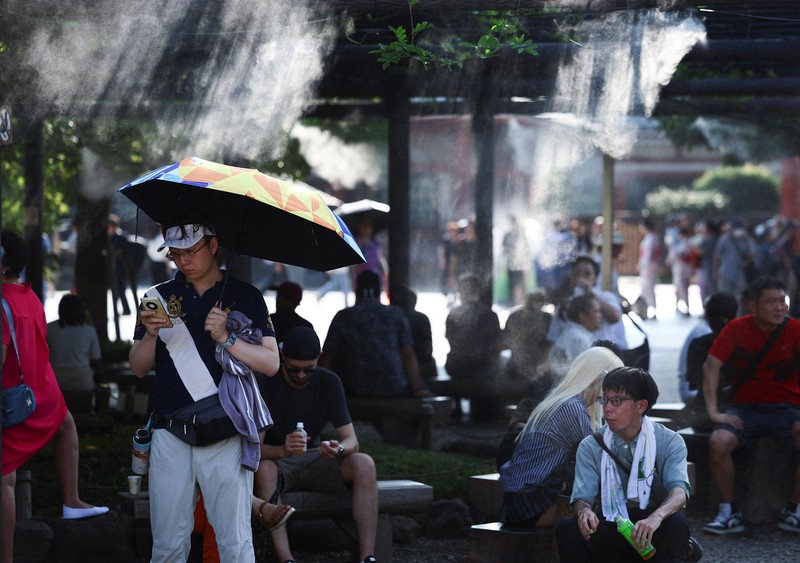Gelombang panas melanda sejumlah wilayah di Jepang, Selasa (5/8/2025) waktu setempat. Gelombang panas melanda sejumlah wilayah di Jepang, Selasa (5/8/2025) waktu setempat. (REUTERS/Issei Kato)