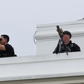 A U.S. Secret Service snipers keep a lookout on the roof of the White House in Washington, D.C., U.S., August 5, 2025. REUTERS/Jonathan Ernst