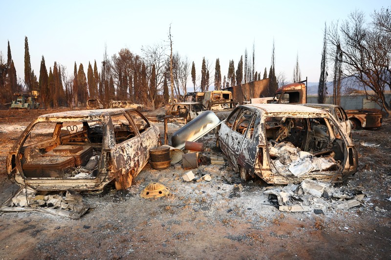 Trees burn during a wildfire near in Saint-Laurent-de-la-Cabrerisse, southern France, August 6, 2025. REUTERS/Abdul Saboor