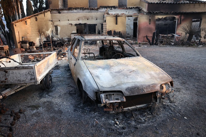 Trees burn during a wildfire near in Saint-Laurent-de-la-Cabrerisse, southern France, August 6, 2025. REUTERS/Abdul Saboor