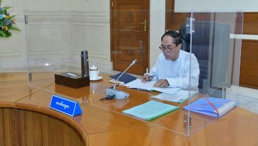 This handout photo from Myanmar's Military Information Team taken and released on January 31, 2023 shows Myanmar's acting president U Myint Swe attending a defense and security council meeting in Naypyidaw. Myanmar's junta said on January 31 the country had