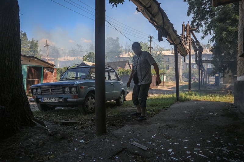 UKRAINE-CRISIS/ATTACK-DONETSK REGION Fire burns in a flat of an apartment building hit by Russian drone strike, amid Russia's attack on Ukraine, in the town of Bilozerske in Donetsk region, Ukraine August 10, 2025. REUTERS/Oleksandr Ratushniak TPX IMAGES OF THE DAY