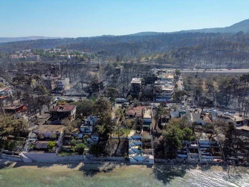 Foto udara menunjukkan dampak akibat kebakaran hutan di dekat Erenkoy, Canakkale, Turki, Selasa (12/8/2025). (REUTERS/Efekan Akyuz) Foto udara menunjukkan dampak akibat kebakaran hutan di dekat Erenkoy, Canakkale, Turki, Selasa (12/8/2025). (REUTERS/Efekan Akyuz)