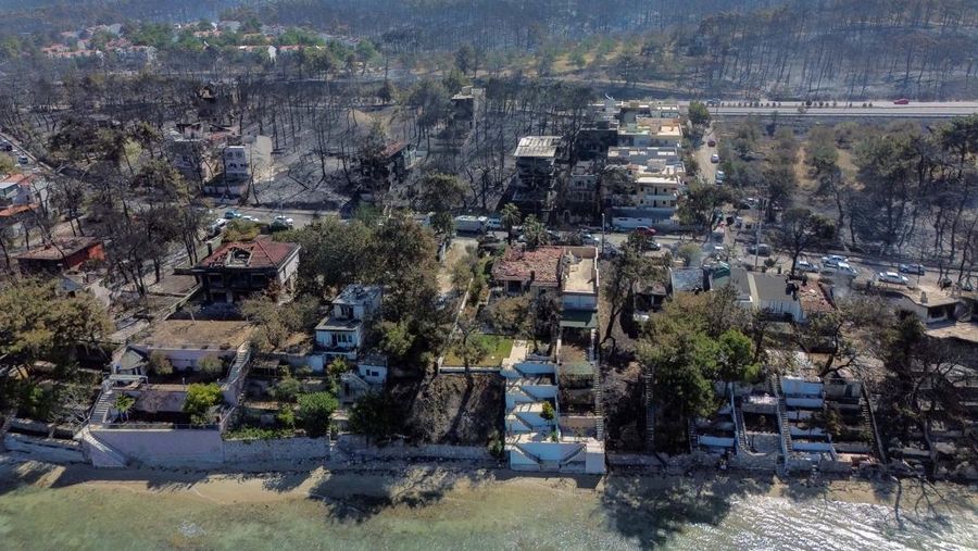 Foto udara menunjukkan dampak akibat kebakaran hutan di dekat Erenkoy, Canakkale, Turki, Selasa (12/8/2025). (REUTERS/Efekan Akyuz)