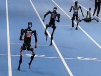 Pertama di Dunia, Potret Unik Robot Ikuti Olimpiade di China