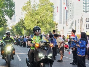 Naik Motor, Kakorlantas Terjun Langsung Pimpin Pengamanan Puncak HUT Ke-80 RI