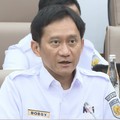 Direktur UTama PT KAI, Bobby Rasyidin saat menyampaikan laporan dalam rapat dengar pendapat dengan Komisi VI DPR RI pada Rabu (20/8/2025). (Tangkapan Layar Youtube/TVR Parlemen)