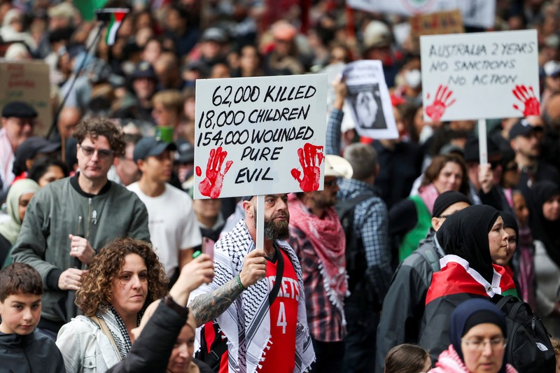 Para demonstranikut serta dalam protes 'Pawai Nasional untuk Palestina' di Sydney, Australia, Minggu (24/8/2025).(REUTERS/Hollie Adams) Para demonstranikut serta dalam protes 'Pawai Nasional untuk Palestina' di Sydney, Australia, Minggu (24/8/2025).(REUTERS/Hollie Adams)