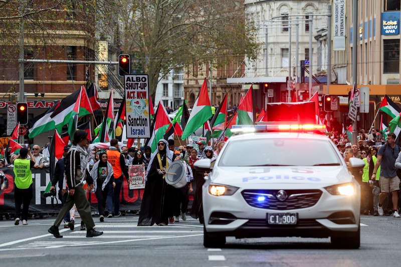 Para demonstranikut serta dalam protes 'Pawai Nasional untuk Palestina' di Sydney, Australia, Minggu (24/8/2025).(REUTERS/Hollie Adams) Para demonstranikut serta dalam protes 'Pawai Nasional untuk Palestina' di Sydney, Australia, Minggu (24/8/2025).(REUTERS/Hollie Adams)