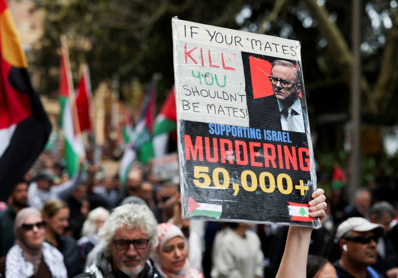 Para demonstranikut serta dalam protes 'Pawai Nasional untuk Palestina' di Sydney, Australia, Minggu (24/8/2025).(REUTERS/Hollie Adams) Para demonstranikut serta dalam protes 'Pawai Nasional untuk Palestina' di Sydney, Australia, Minggu (24/8/2025).(REUTERS/Hollie Adams)