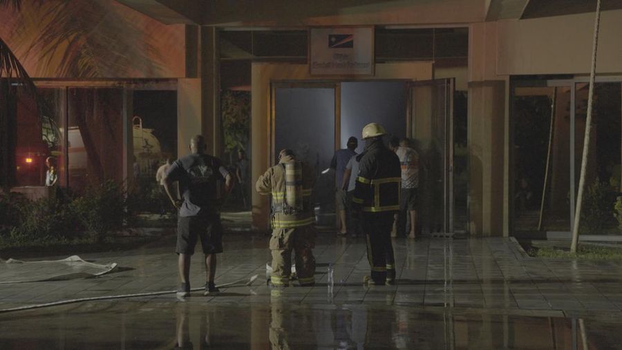 The charred remains of the national parliament of the Marshall Islands, following a fire, in Majuro, Marshall Islands, August 26, 2025, in this screengrab obtained from social media. Chewy Lin/via REUTERS  THIS IMAGE HAS BEEN SUPPLIED BY A THIRD PARTY. MANDATORY CREDIT. NO RESALES. NO ARCHIVES. VERIFICATION: Building structure, signage and the badge on the firefighters match file images. Date verified by the metadata on the file