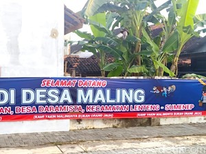 Baliho Selamat Datang di Desa Maling Terpasang di Sumenep