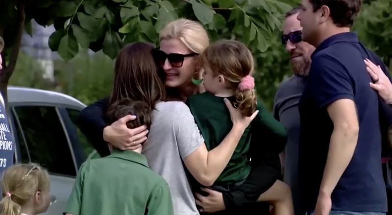 USA-MINNEAPOLIS/SHOOTING Families and loved ones reunite outside the police barricades after a shooting at Annunciation Church, which is also home to an elementary school, in Minneapolis, Minnesota, U.S. August 27, 2025. REUTERS/Ben Brewer