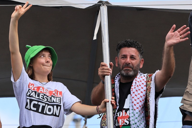 Aktivis asal Swedia, Greta Thunberg, kembali berlayar bersama sejumlah kapal menuju Jalur Gaza, untuk membawa bantuan kemanusiaan, Senin (1/9/2025). Aktivis asal Swedia, Greta Thunberg, kembali berlayar bersama sejumlah kapal menuju Jalur Gaza, untuk membawa bantuan kemanusiaan, Senin (1/9/2025). (REUTERS/Nacho Doce)