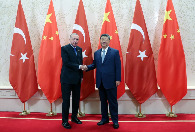 Para pemimpin dan pejabat, termasuk Presiden China Xi Jinping dan Presiden Rusia Vladimir Putin, menghadiri upacara foto di pertemuan puncak Organisasi Kerjasama Shanghai (SCO) di Tianjin, China, 31 Agustus 2025. Para pemimpin dan pejabat, termasuk Presiden China Xi Jinping dan Presiden Rusia Vladimir Putin, menghadiri upacara foto di pertemuan puncak Organisasi Kerjasama Shanghai (SCO) di Tianjin, China, 31 Agustus 2025. (Sputnik/Alexander Kazakov/Pool via REUTERS)