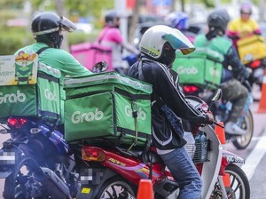 Parlemen Malaysia Sahkan UU Perlindungan Driver Ojol cs