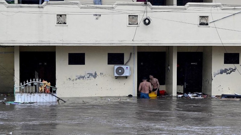 Dampak banjir di Denpasar, Bali, Indonesia, Rabu (10/9/2025). (SONNY TUMBELAKA / AFP)