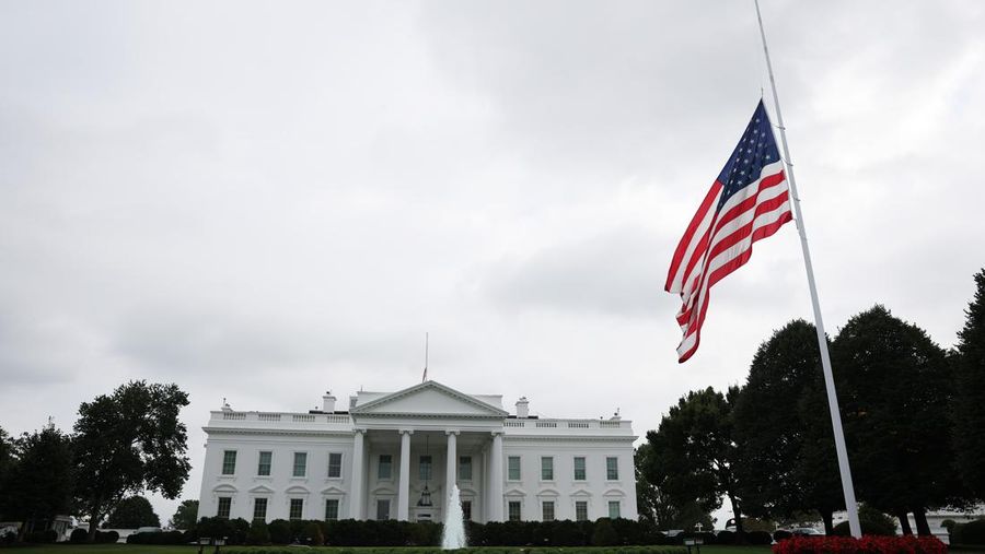 WASHINGTON, DC - SEPTEMBER 10: The American flags near the White House on the North Lawn fly at half staff following the death of Turning Point USA founder and conservative activist Charlie Kirk on September 10, 2025 in Washington, DC. Kirk was shot and killed while speaking at Utah Valley University earlier today.  (Photo by Anna Moneymaker/Getty Images)