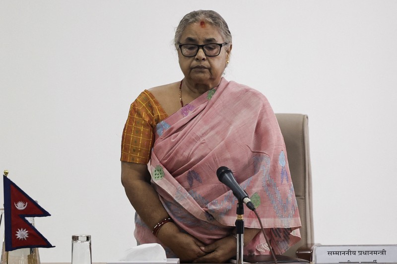Perdana Menteri baru Nepal, Sushila Karki, menyampaikan pernyataan publik perdana usai dilantik, Minggu (14/9/2025). (Navesh Chitrakar/Navesh Chitrakar)