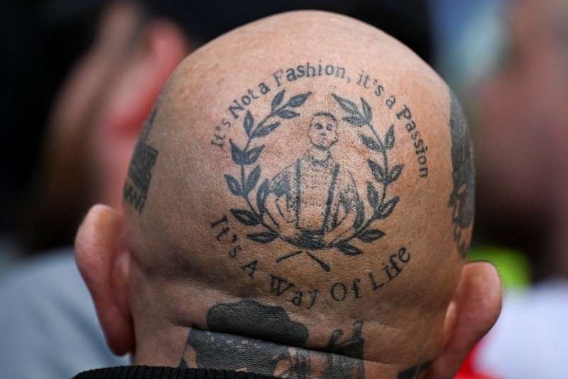 Petugas polisi berjaga di antara kelompok anti-fasis dan pendukung Tommy Robinson selama demonstrasi anti-imigrasi yang diselenggarakan oleh aktivis anti-imigrasi Inggris Stephen Yaxley-Lennon, yang juga dikenal sebagai Tommy Robinson, di London, Inggris, 13 September 2025. Petugas polisi berjaga di antara kelompok anti-fasis dan pendukung Tommy Robinson selama demonstrasi anti-imigrasi yang diselenggarakan oleh aktivis anti-imigrasi Inggris Stephen Yaxley-Lennon, yang juga dikenal sebagai Tommy Robinson, di London, Inggris, 13 September 2025. (REUTERS/Jaimi Joy)