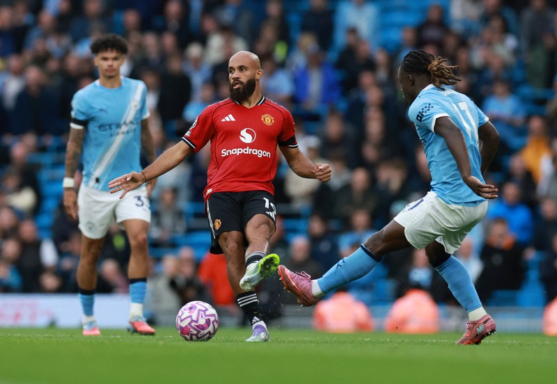 Erling Haaland merayakan gol keduanya untuk Manchester City dalam laga Liga Primer melawan Manchester United di Etihad Stadium, Manchester, 14 September 2025. Erling Haaland merayakan gol keduanya untuk Manchester City dalam laga Liga Primer melawan Manchester United di Etihad Stadium, Manchester, 14 September 2025. (REUTERS/Phil Noble)