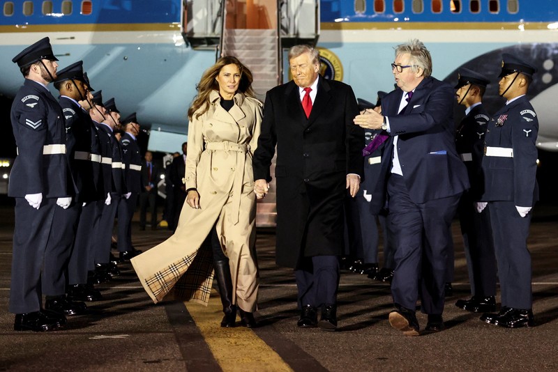 USA-TRUMP/BRITAIN-ARRIVAL U.S. President Donald Trump and first lady Melania Trump disembark Air Force One as they arrive for their state visit to Britain, at London Stansted Airport near London, Britain, September 16, 2025. REUTERS/Chris Radburn