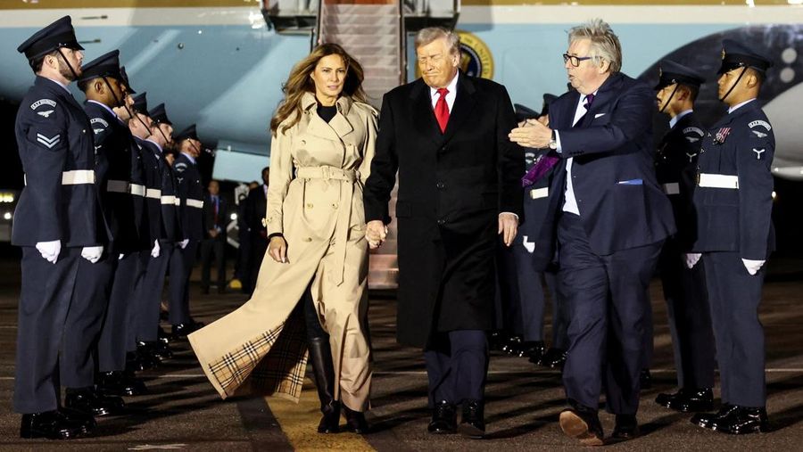 U.S. President Donald Trump and first lady Melania Trump disembark Air Force One as they arrive for their state visit to Britain, at London Stansted Airport near London, Britain, September 16, 2025. REUTERS/Chris Radburn