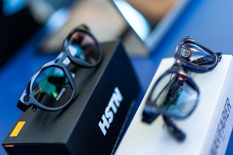 Meta CEO Mark Zuckerberg wears the Meta Ray-Ban Display glasses, as he delivers a speech presenting the new line of smart glasses, during the Meta Connect event at the company's headquarters in Menlo Park, California, U.S., September 17, 2025. REUTERS/Carlos Barria