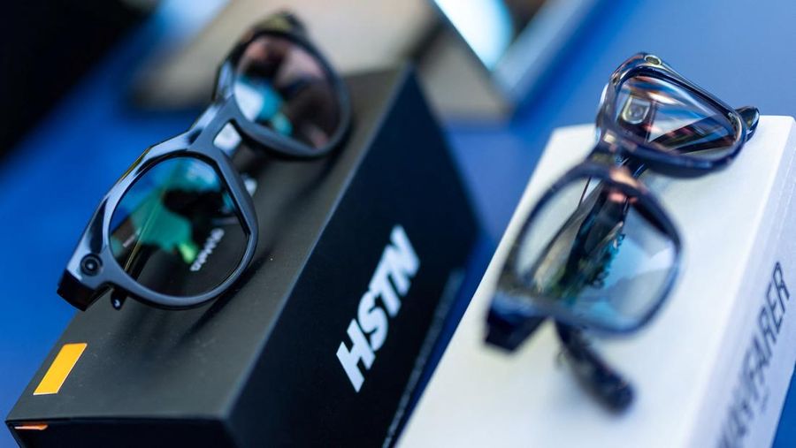 Meta CEO Mark Zuckerberg wears the Meta Ray-Ban Display glasses, as he delivers a speech presenting the new line of smart glasses, during the Meta Connect event at the company's headquarters in Menlo Park, California, U.S., September 17, 2025. REUTERS/Carlos Barria