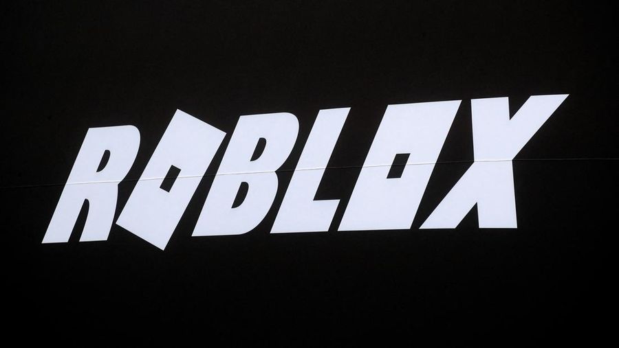 FILE PHOTO: The Roblox logo is displayed on a banner, to celebrate the company's IPO, on the front facade of the New York Stock Exchange (NYSE) in New York, U.S., March 10, 2021. REUTERS/Brendan McDermid/File Photo
