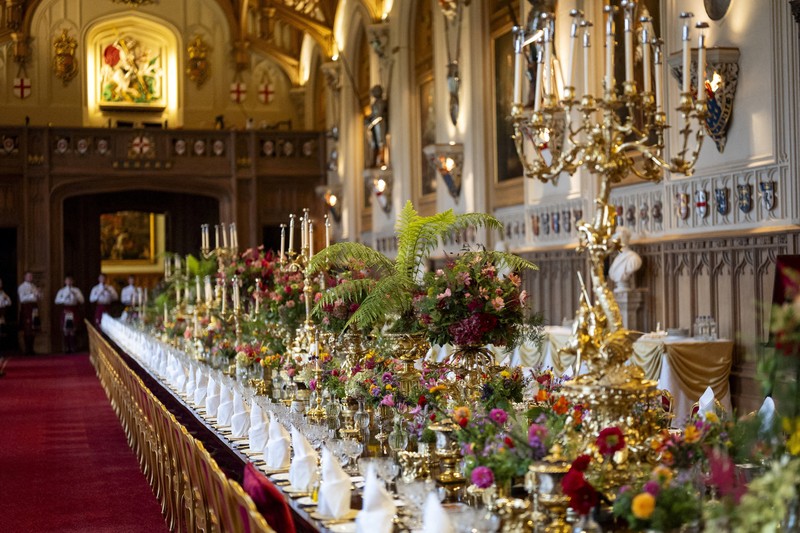Pipers rehearse next to the banquet table in St George's Hall, Windsor Castle, Berkshire, ahead of the state banquet for U.S. President Donald Trump and his wife, First Lady Melania Trump, on day one of their second state visit to the UK, Wednesday September 17, 2025.    Aaron Chown/Pool via REUTERS
