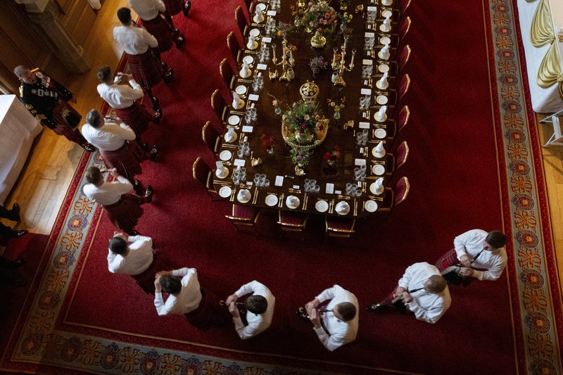 Pipers rehearse next to the banquet table in St George's Hall, Windsor Castle, Berkshire, ahead of the state banquet for U.S. President Donald Trump and his wife, First Lady Melania Trump, on day one of their second state visit to the UK, Wednesday September 17, 2025.    Aaron Chown/Pool via REUTERS