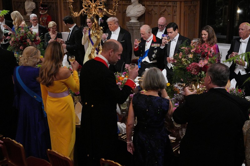Pipers rehearse next to the banquet table in St George's Hall, Windsor Castle, Berkshire, ahead of the state banquet for U.S. President Donald Trump and his wife, First Lady Melania Trump, on day one of their second state visit to the UK, Wednesday September 17, 2025.    Aaron Chown/Pool via REUTERS