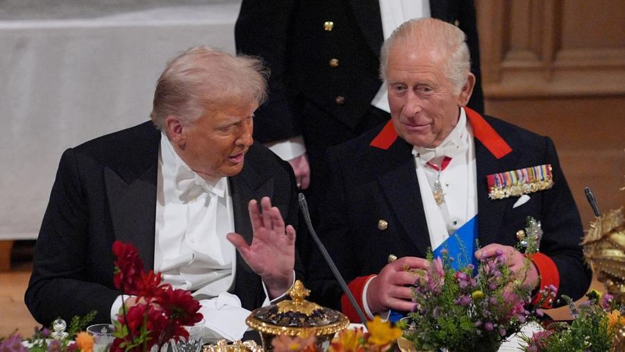Pipers rehearse next to the banquet table in St George's Hall, Windsor Castle, Berkshire, ahead of the state banquet for U.S. President Donald Trump and his wife, First Lady Melania Trump, on day one of their second state visit to the UK, Wednesday September 17, 2025.    Aaron Chown/Pool via REUTERS