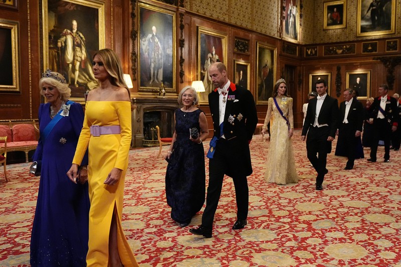 Pipers rehearse next to the banquet table in St George's Hall, Windsor Castle, Berkshire, ahead of the state banquet for U.S. President Donald Trump and his wife, First Lady Melania Trump, on day one of their second state visit to the UK, Wednesday September 17, 2025.    Aaron Chown/Pool via REUTERS
