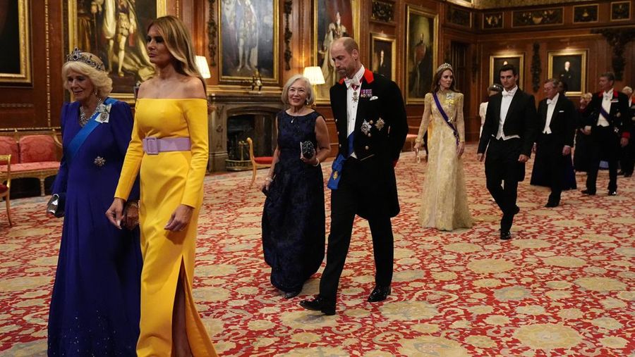 Pipers rehearse next to the banquet table in St George's Hall, Windsor Castle, Berkshire, ahead of the state banquet for U.S. President Donald Trump and his wife, First Lady Melania Trump, on day one of their second state visit to the UK, Wednesday September 17, 2025.    Aaron Chown/Pool via REUTERS