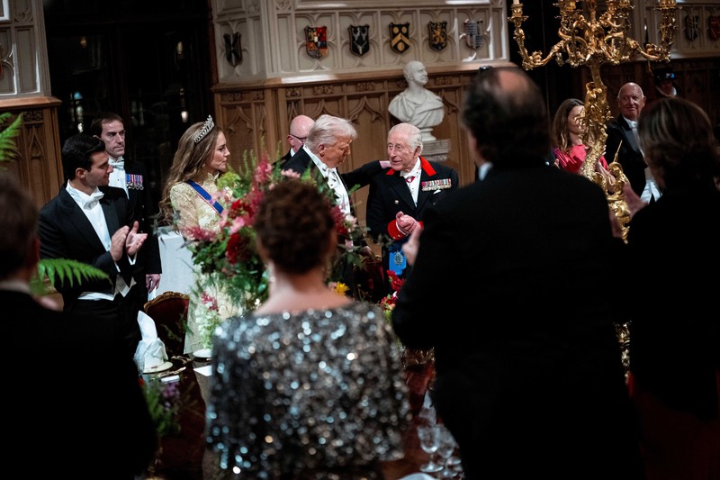 Pipers rehearse next to the banquet table in St George's Hall, Windsor Castle, Berkshire, ahead of the state banquet for U.S. President Donald Trump and his wife, First Lady Melania Trump, on day one of their second state visit to the UK, Wednesday September 17, 2025.    Aaron Chown/Pool via REUTERS