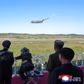 Gaya Kim Jong Un Bertopi, Senyum Manis Pamer Drone Maut Kumsong