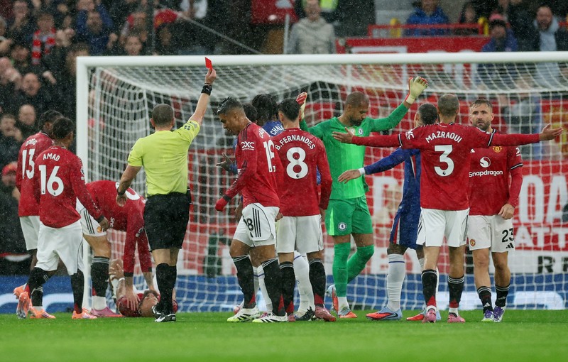 Laga Manchester United vs Chelsea di Stadion Old Trafford, Manchester, Minggu (21/9/2025) dini hari WIB. (REUTERS/Phil Noble) Laga Manchester United vs Chelsea di Stadion Old Trafford, Manchester, Minggu (21/9/2025) dini hari WIB. (REUTERS/Phil Noble)