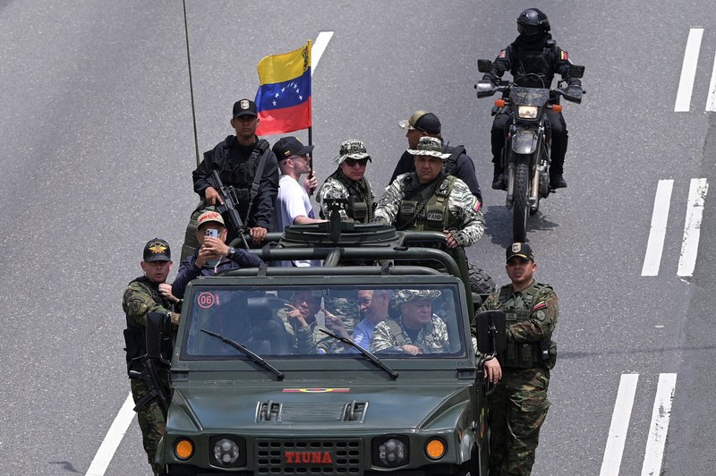 Pemerintah Venezuela pada Sabtu (20/9) kemarin menggelar pelatihan mlitier selama satu hari bagi warga sipil, (REUTERS/Leonardo Fernandez Viloria)